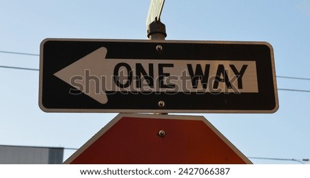 One way street sign on a blue sky background DSLR high resolution photo