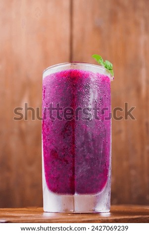 dragon fruit juice on a wooden background