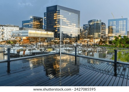 Boston, Massachusetts, USA cityscape and marina at twilight.