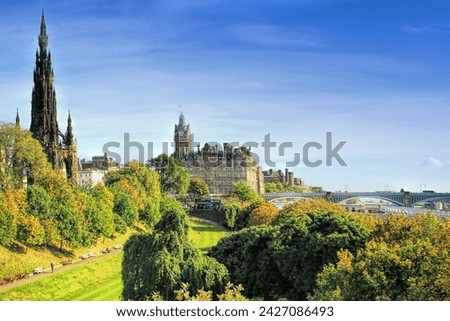 Capture the timeless allure of Edinburgh with this stunning cityscape photograph. The majestic Edinburgh Castle stands proudly atop its rocky perch, overlooking the historic Old Town and the bustling 