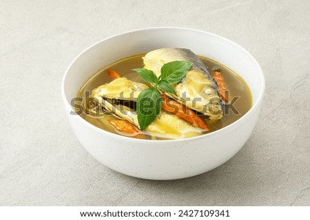 Pindang serani, fish soup with sour and spicy salty spices. Indonesian Food
 Royalty-Free Stock Photo #2427109341