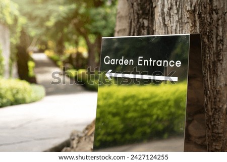 Garden entrance  sign saying to garden