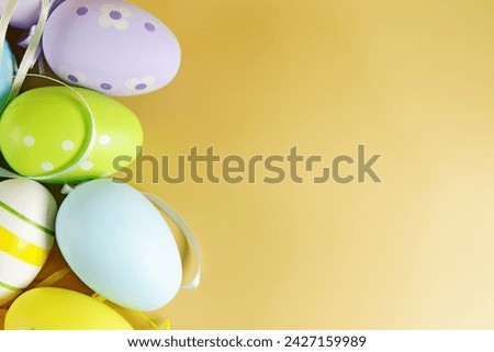 colorful Easter eggs on beige color backgrounds copy space stock photo