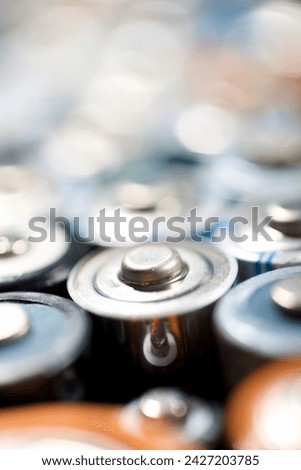 Close up of a large group of used batteries for recycling process Royalty-Free Stock Photo #2427203785