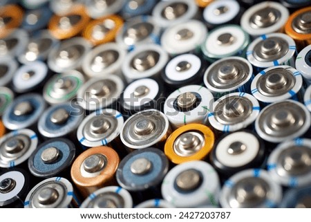 Close up of a large group of used batteries for recycling process Royalty-Free Stock Photo #2427203787