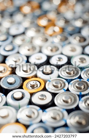 Close up of a large group of used batteries for recycling process Royalty-Free Stock Photo #2427203797