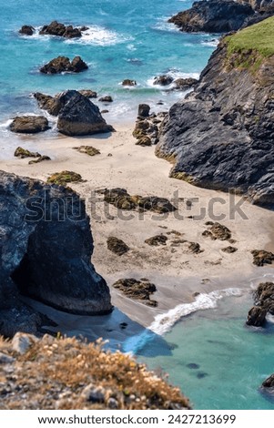 Kynance Cove beach photo aerial view in a sunny day, The Lizard Peninsula, Cornwall. South West England.