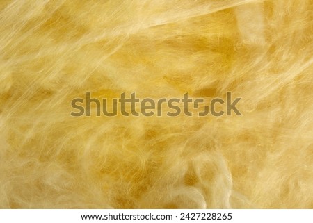 Background of glass wool batt insulation Royalty-Free Stock Photo #2427228265
