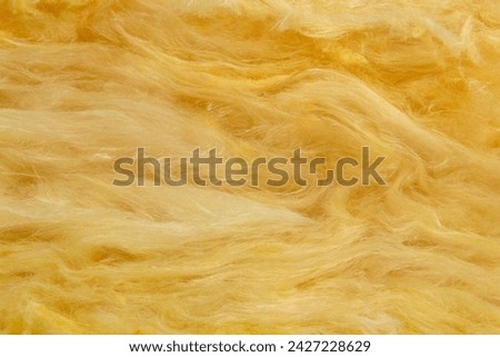 Texture of glass wool batt insulation Royalty-Free Stock Photo #2427228629
