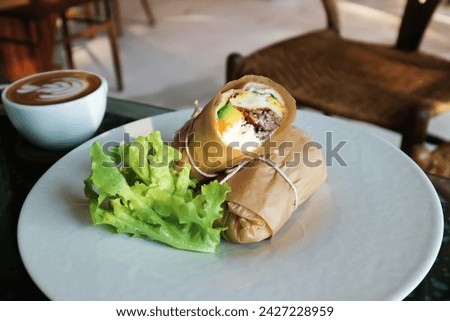 kebab ,pork wraps or taco or vegetable roll or mexican rolls or beef wrap or egg rolls or egg wrap in paper sheet