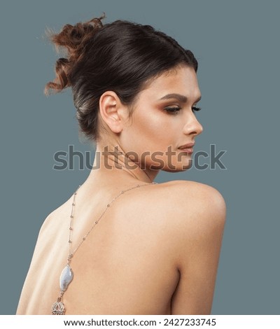 Beautiful jewelry model. Woman with bijou close up Royalty-Free Stock Photo #2427233745