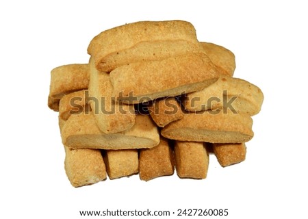 Plain Menen bakery, oriental crackers and cookies, usually baked plain or stuffed with tamr, Ajwa or dates, Arabic Egyptian oriental cuisine of cookies, consumed as a snack with a drink like tea Royalty-Free Stock Photo #2427260085