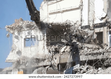 Demolition shears; demolition excavator, debris of a demolished house, Bremen, Germany, Europe Royalty-Free Stock Photo #2427273997