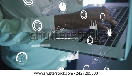 Image of data processing over african american male it engineer with laptop. Global computing and data processing concept digitally generated image.