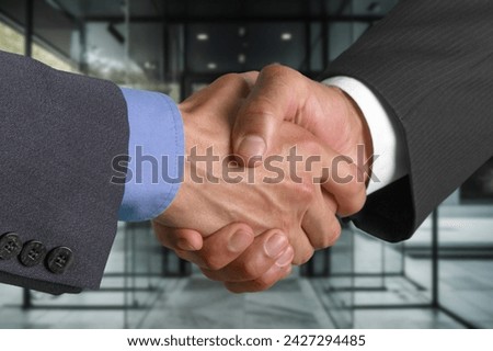 Good deal. business people hands shake in office