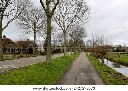 Bicycle path and road at Middelweg in Moordrecht in the Netherlands
