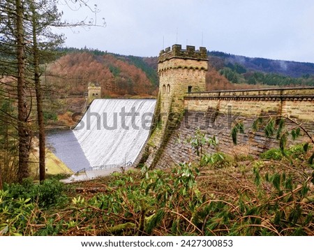 Derwent Dam east tower. The current was strong, the sound was beautiful. Derwent Valley, Peak District. Royalty-Free Stock Photo #2427300853