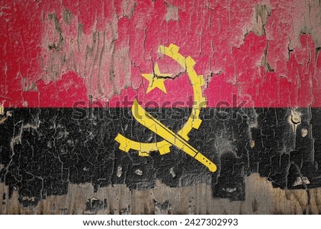 Angola flag and paint cracks. Prison concept with border image. Angola is currently heading toward recession. Inflation. employment. economic recession. Double exposure hologram