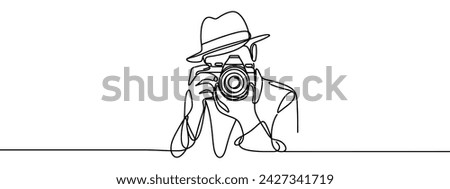 Continuous line drawing of professional man photographer take picture use camera. One line art concept of photography. Vector illustration Royalty-Free Stock Photo #2427341719