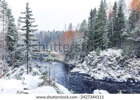 Suna River on a cold snowy winter day, landscape photo of Kivach Natural Reserve, Kondopoga District, Republic of Karelia, Russia