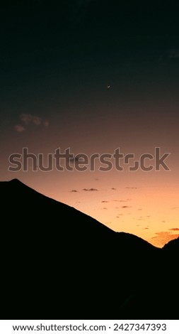 Sunset in the Teide National Park with the moon in the background