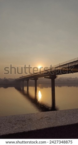 Sunrise at the Sabarmati Riverfront in Ahmedabad  Royalty-Free Stock Photo #2427348875