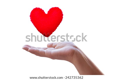 pillow heart in hands on white background, Valentine`s day background.