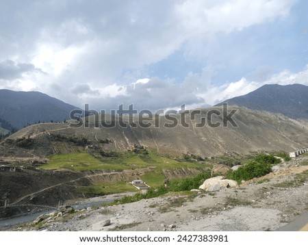 Image of beastiful mountains touching the height of sky and clouds best scenery picture and best image for refrences