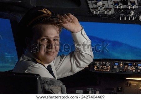 Pilot adjusts hat and proceeds to engage autopilot feature. Captain relinquishes manual control to sophisticated onboard computer Royalty-Free Stock Photo #2427404409