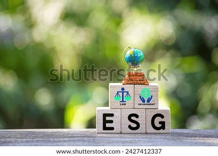 ESG environment social governance investment business concept. Women use a computer to analyze ESG, surrounded by ESG icons .close to the computer screen in business investment strategy concept.
