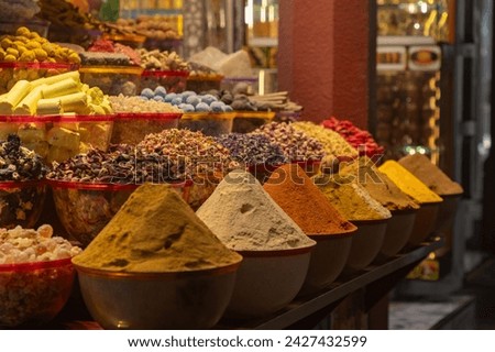 A picture of colorful spices on a store at the Dubai Spice Souk.
