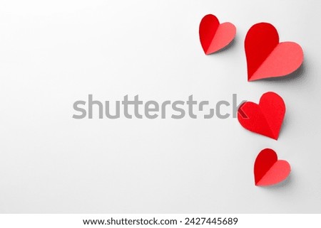 Paper hearts on white background, flat lay. Space for text