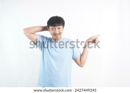 Young Man Pointing At Something - Isolated