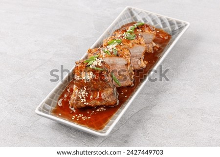 roasted appetizing pork on a stone background studio food photo 4