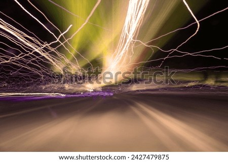 Mystical night journey by car and lights, luminous flux, color abstract background for text