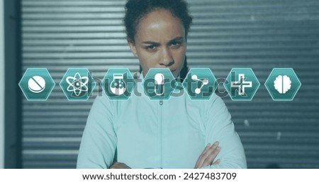 Multiple medical icons against portrait of african american woman with crossed arms. medical research and sport concept