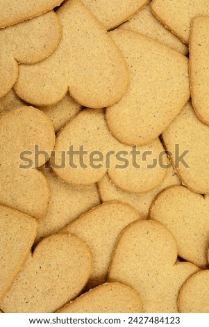 Gingerbread cookies in the form of heart background. 