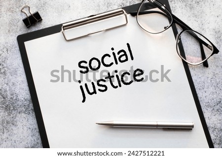 Composition of world day for social justice text over gavel. World day for social justice and celebration concept digitally generated image.
