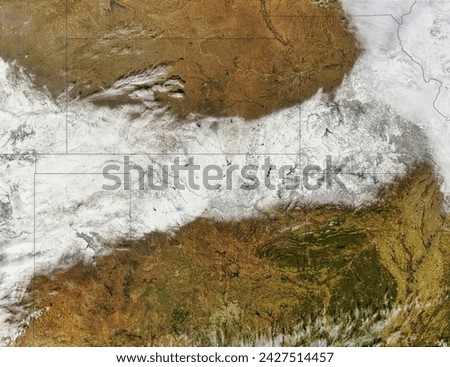 Snowstorm Rolls Across the U.S. . Elements of this image furnished by NASA.