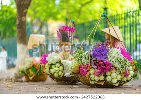 Mobile flower store on bicycle is iconic image of Ha Noi. One of the best moments to see these special stores is autumn with many fantastic flowers.