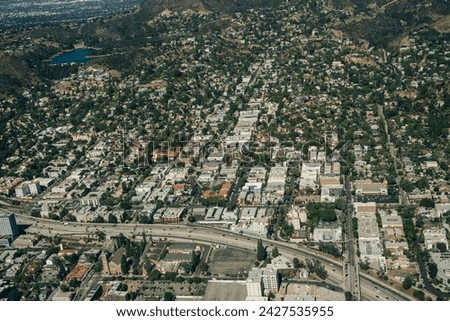 aerial view of Los Angeles with busy freeway . High quality photo