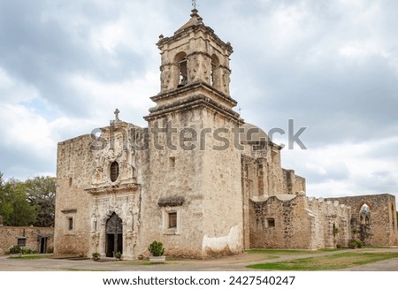 Traditional brick architecture of the old Mission San Jose located at the San Antonio Mission Historical park in San Antonio Texas. Picture is taken on a cloudy overcast day Royalty-Free Stock Photo #2427540247