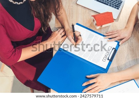 Close up Team Businesswoman hands partners sign contract with success business deal. Diversity Businesswoman teams handshake together. Partnership teamwork meeting signing contract business concept