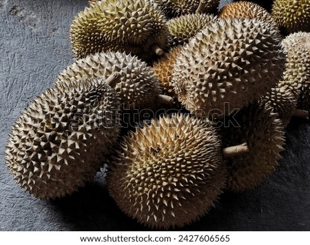 Group of fresh durians in the durian market