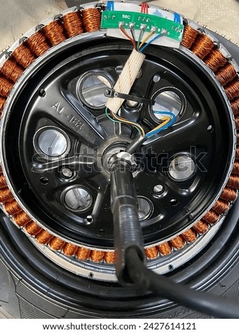 500 watt electric bicycle BLDC dynamo, the Hall Sensor is being repaired Royalty-Free Stock Photo #2427614121