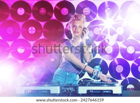 Portrait, music and woman dj with mixer on wall background for entertainment at club, disco or party. Concert, dance or event with light for performance and disc jockey mixing audio or sound