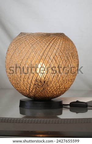 Lampshade, lamp, table lamp home decor object on isolated background Royalty-Free Stock Photo #2427655599