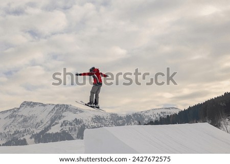 Children and adults, happy family in winter clothing at ski vacation, skiing, wintertime