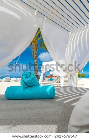 Relax on luxury VIP beach. White pavilion canopy sunny blue sky. Luxury vacation tourism holiday in tropical resort hotel. Couple retreat Fantastic leisure lifestyle landscape palm trees white sand