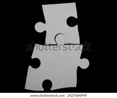 2 two black carton jigsaw puzzles isolated on white background. Double piece flat puzzle. Two section compare service banner.